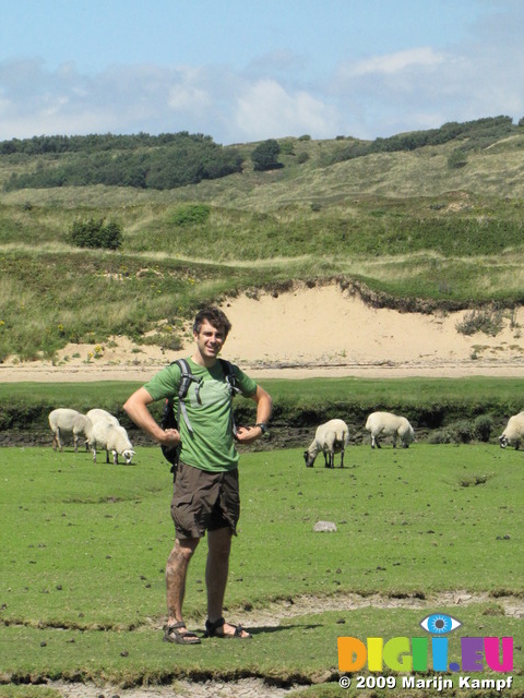 SX07959 Wouko on bank of Ogmore River framed my sheep